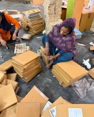 Factory Workers Packing Products